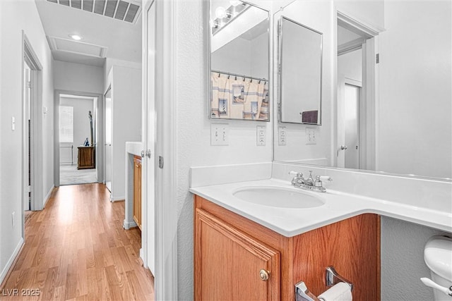 8853 Kingswood Dr, Las Vegas, NV 89147 - bathroom with vanity and wood finished floors