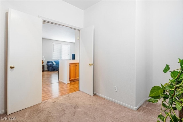 8853 Kingswood Dr, Las Vegas, NV 89147 - bedroom with light carpet and baseboards