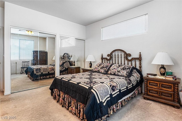 8853 Kingswood Dr, Las Vegas, NV 89147 - carpeted bedroom featuring two closets