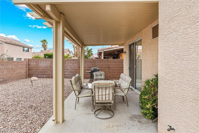 8853 Kingswood Dr, Las Vegas, NV 89147 - fenced backyard with outdoor dining space, a patio area, and a grill