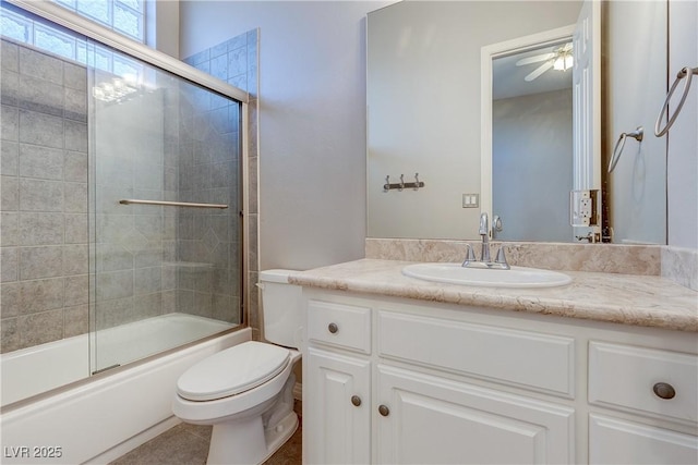 5193 N Miller Ln, Las Vegas, NV 89149 - bathroom featuring vanity, combined bath / shower with glass door, and ceiling fan