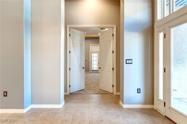5193 N Miller Ln, Las Vegas, NV 89149 - corridor featuring light tile patterned floors and baseboards