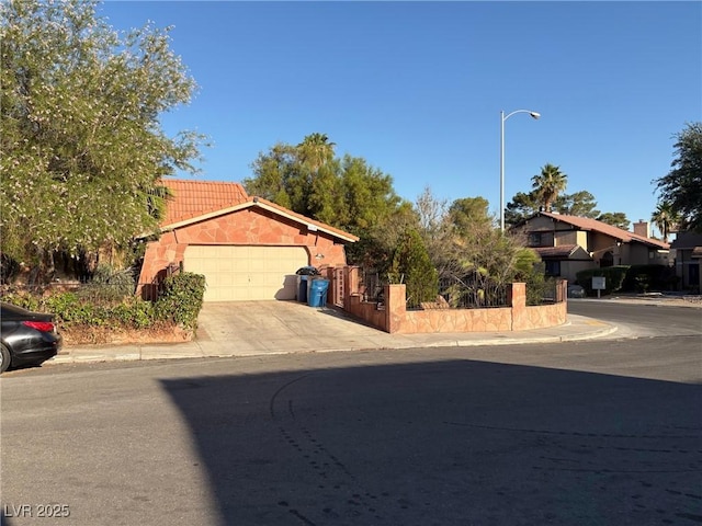 3167 El Cedro Cir, Las Vegas, NV 89121 - ranch-style house featuring a garage and driveway