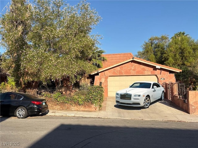 3167 El Cedro Cir, Las Vegas, NV 89121 - view of front of home with driveway and a garage