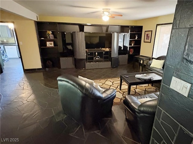3167 El Cedro Cir, Las Vegas, NV 89121 - living area with ceiling fan and stone finish flooring