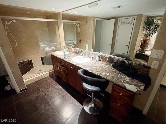 3167 El Cedro Cir, Las Vegas, NV 89121 - bathroom featuring a stall shower and double vanity