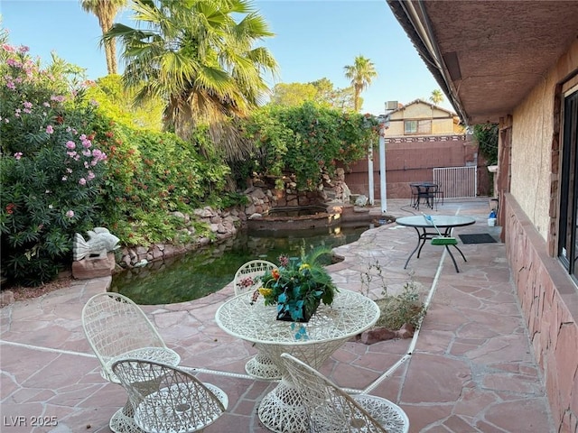 3167 El Cedro Cir, Las Vegas, NV 89121 - fenced backyard with a patio