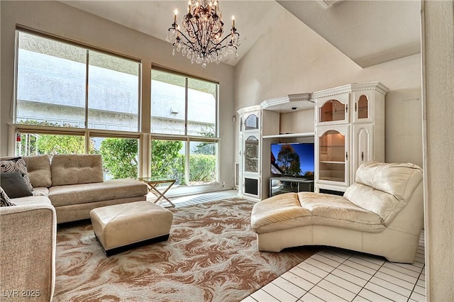 940 Vegas Valley Dr, Las Vegas, NV 89109 - living area featuring a chandelier, high vaulted ceiling, and light tile patterned floors