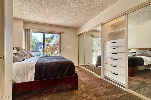 940 Vegas Valley Dr, Las Vegas, NV 89109 - bedroom featuring access to outside, dark carpet, and a textured ceiling