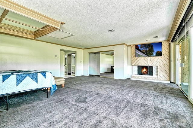 940 Vegas Valley Dr, Las Vegas, NV 89109 - carpeted bedroom with crown molding, a textured ceiling, a brick fireplace, and multiple windows