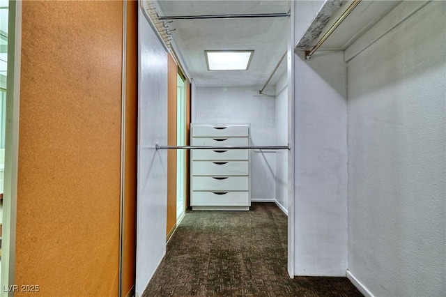 940 Vegas Valley Dr, Las Vegas, NV 89109 - walk in closet featuring dark carpet