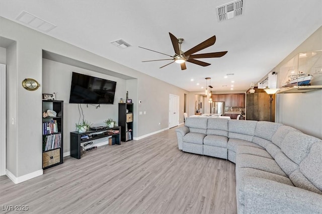 2383 Elmont Ave, North Las Vegas, NV 89086 - living room with ceiling fan, light wood-style floors, and recessed lighting