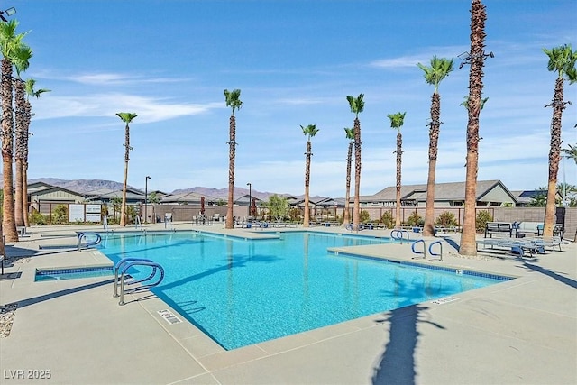 2383 Elmont Ave, North Las Vegas, NV 89086 - community pool featuring a patio area and a residential view