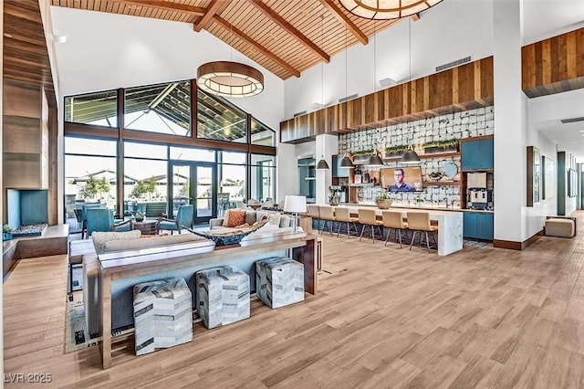 2383 Elmont Ave, North Las Vegas, NV 89086 - dining space featuring high vaulted ceiling, light wood-type flooring, and beam ceiling
