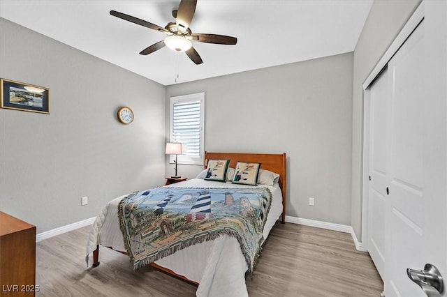 2383 Elmont Ave, North Las Vegas, NV 89086 - bedroom with a closet, wood finished floors, and ceiling fan
