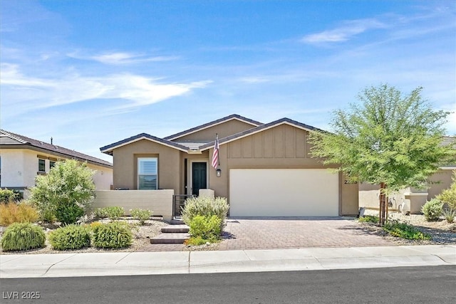 2383 Elmont Ave, North Las Vegas, NV 89086 - single story home featuring a garage, driveway, and stucco siding