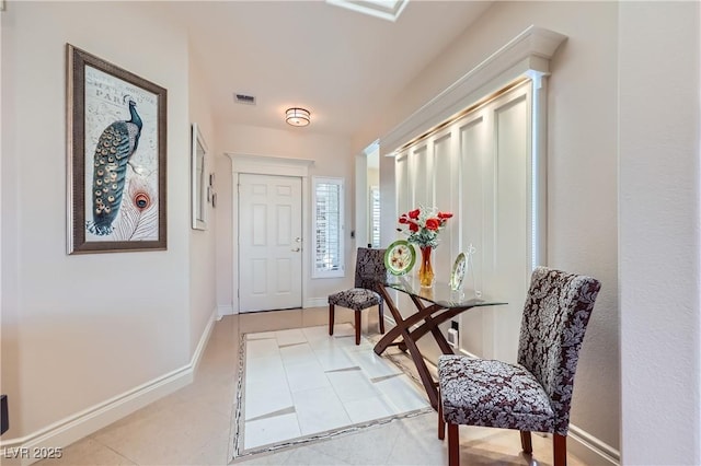 1897 Holdenville St, Henderson, NV 89052 - foyer entrance with light tile patterned floors and baseboards