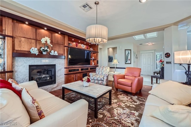1897 Holdenville St, Henderson, NV 89052 - living area with wood finished floors and a high end fireplace