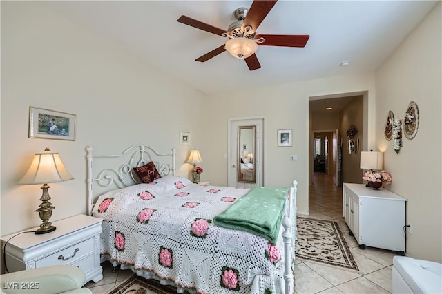 1897 Holdenville St, Henderson, NV 89052 - bedroom featuring light tile patterned flooring and ceiling fan