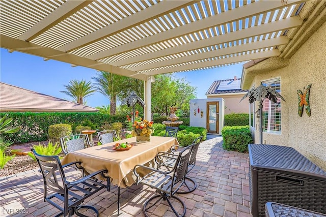 1897 Holdenville St, Henderson, NV 89052 - view of patio with outdoor dining space and a pergola