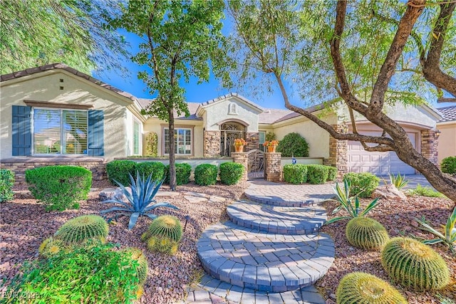 1897 Holdenville St, Henderson, NV 89052 - mediterranean / spanish house with stucco siding and stone siding