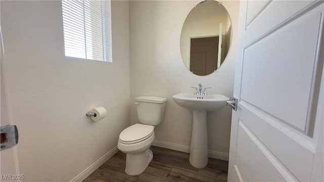 2713 Abrantes Pl, Henderson, NV 89044 - half bathroom featuring toilet and wood finished floors