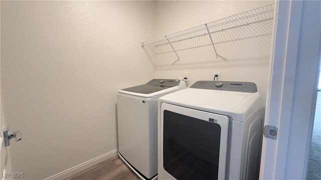 2713 Abrantes Pl, Henderson, NV 89044 - laundry area with independent washer and dryer and dark wood-style floors