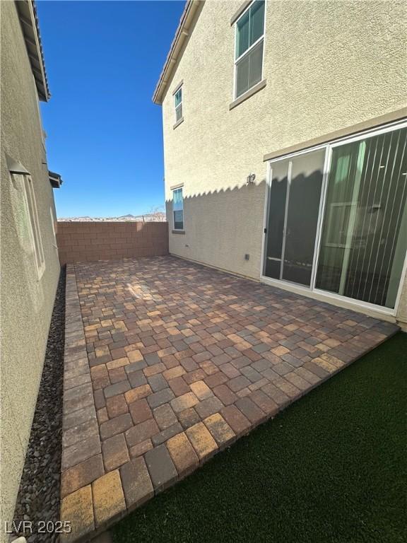 2713 Abrantes Pl, Henderson, NV 89044 - fenced backyard featuring a patio