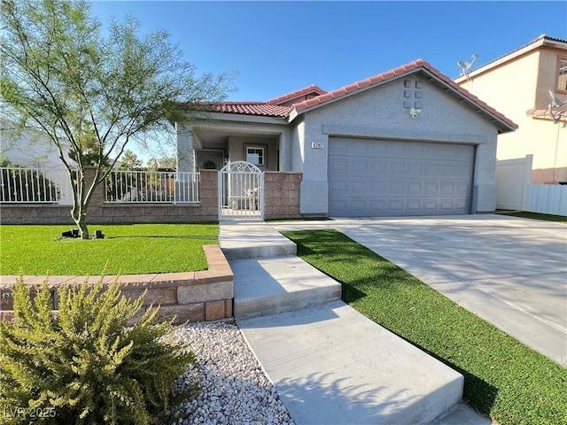 6292 Yucca Valley Ct, Las Vegas, NV 89142 - view of front of house with a tile roof, stucco siding, an attached garage, and driveway