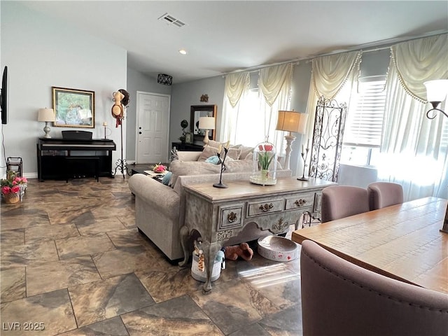 6292 Yucca Valley Ct, Las Vegas, NV 89142 - living area featuring stone finish floors and baseboards