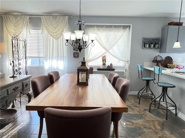 6292 Yucca Valley Ct, Las Vegas, NV 89142 - dining area with a chandelier and baseboards