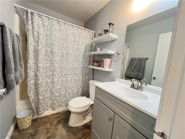 6292 Yucca Valley Ct, Las Vegas, NV 89142 - full bathroom featuring vanity, stone finish floors, and shower / bath combo with shower curtain