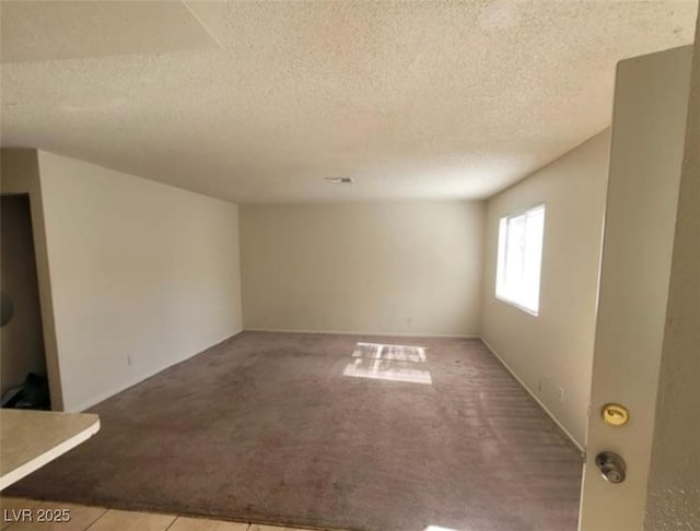 4300 N Lamont St Unit 232, Las Vegas, NV 89115 - carpeted spare room with a textured ceiling