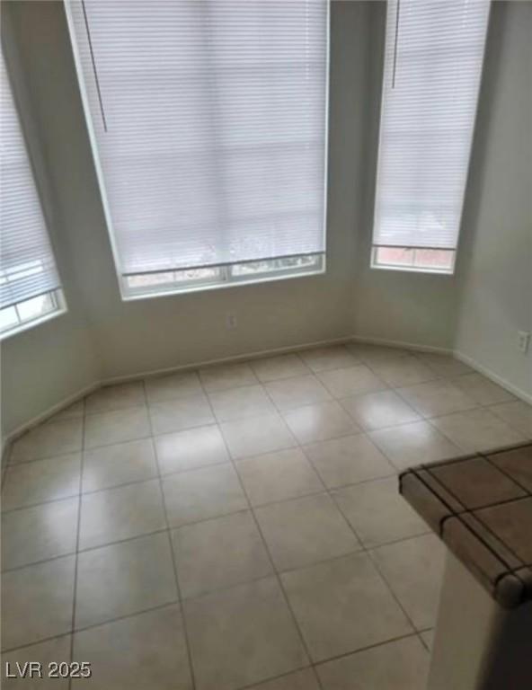 3237 Perching Bird Ln, North Las Vegas, NV 89084 - unfurnished room featuring tile patterned flooring and baseboards