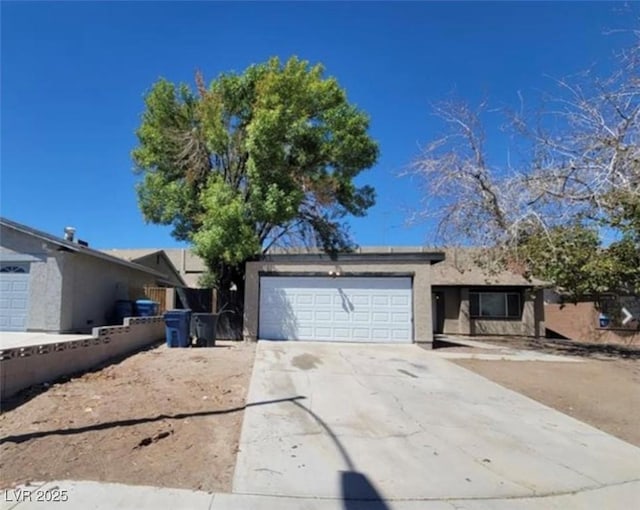 3755 Chutney St, Las Vegas, NV 89121 - single story home featuring a garage, concrete driveway, and stucco siding