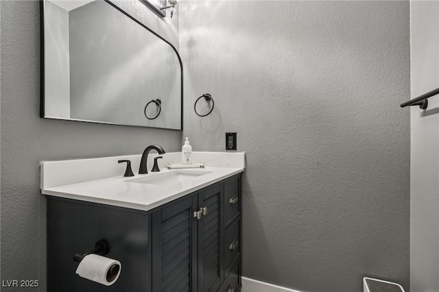 667 Del Prado Dr, Boulder City, NV 89005 - bathroom featuring vanity and a textured wall