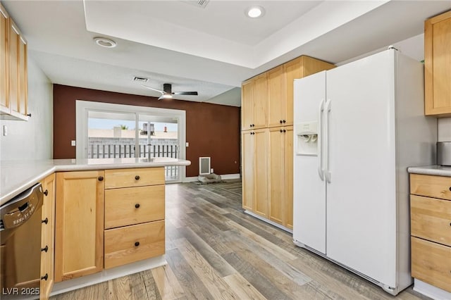 667 Del Prado Dr, Boulder City, NV 89005 - kitchen featuring white refrigerator with ice dispenser, dishwashing machine, light brown cabinetry, and recessed lighting