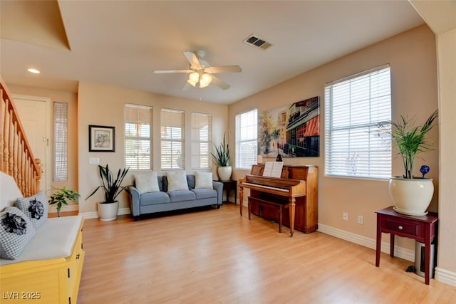 98 Milicity Rd, Henderson, NV 89012 - living area featuring a ceiling fan, light wood-style flooring, stairway, and recessed lighting