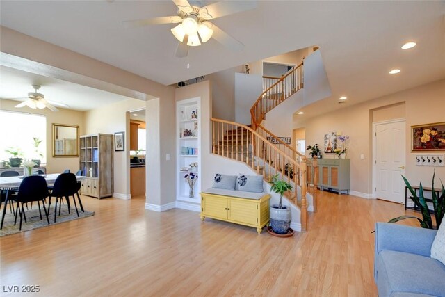 98 Milicity Rd, Henderson, NV 89012 - living area with a ceiling fan, light wood-style floors, stairway, and recessed lighting