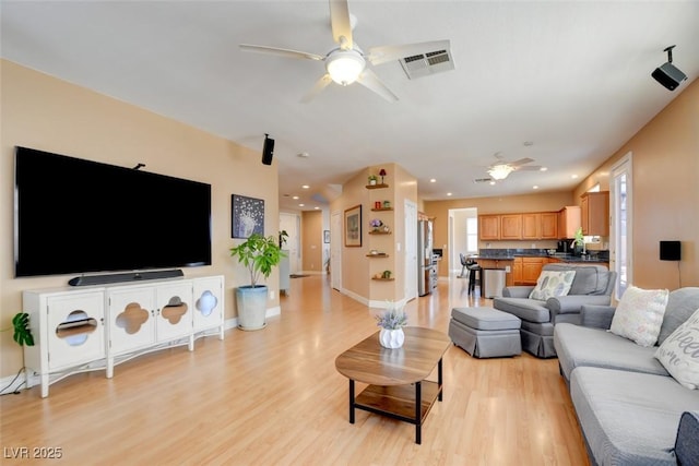 98 Milicity Rd, Henderson, NV 89012 - living area featuring ceiling fan, light wood-style floors, and recessed lighting