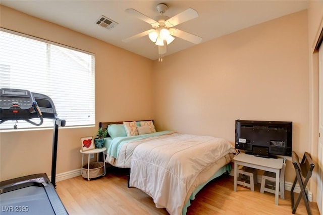 98 Milicity Rd, Henderson, NV 89012 - bedroom with wood finished floors and a ceiling fan