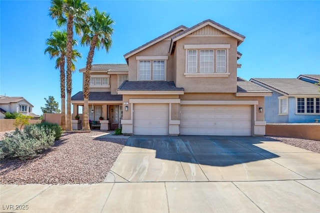 98 Milicity Rd, Henderson, NV 89012 - view of front facade featuring a garage, stucco siding, and concrete driveway