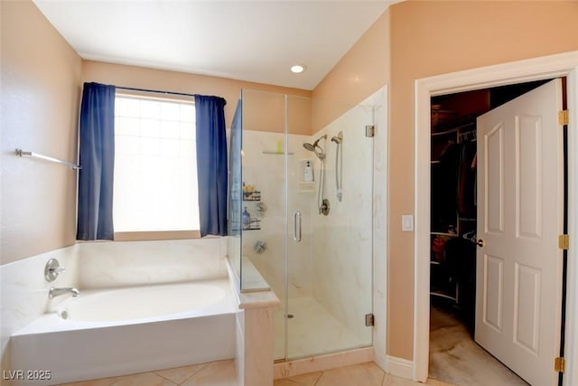 98 Milicity Rd, Henderson, NV 89012 - bathroom featuring a bath, a shower stall, and tile patterned floors