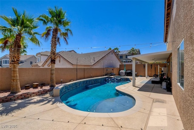 98 Milicity Rd, Henderson, NV 89012 - view of pool with a fenced backyard, a patio, a pool with connected hot tub, and a residential view