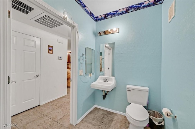 6868 Sky Pointe Dr Unit 1107, Las Vegas, NV 89131 - half bath with tile patterned flooring and toilet