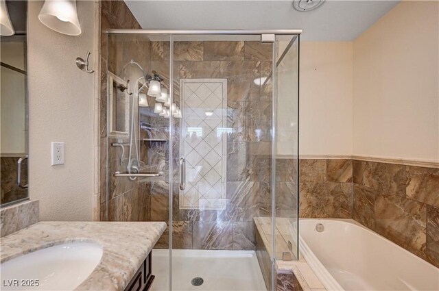 902 Dianne Dr, Boulder City, NV 89005 - bathroom featuring vanity, a bath, and a shower stall
