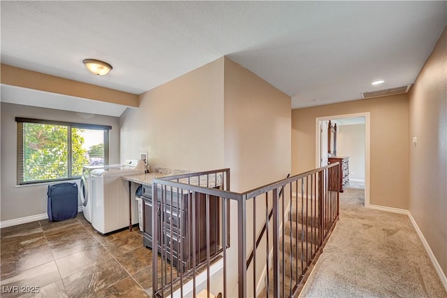 902 Dianne Dr, Boulder City, NV 89005 - hall with washer and dryer and an upstairs landing