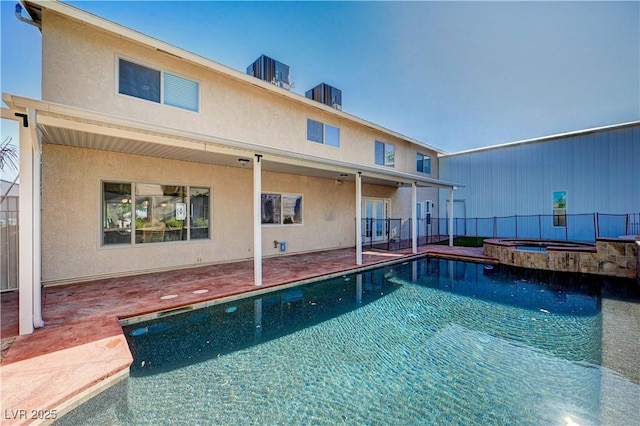 902 Dianne Dr, Boulder City, NV 89005 - view of swimming pool featuring a patio and a pool with connected hot tub
