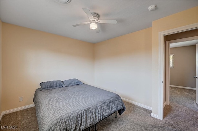 902 Dianne Dr, Boulder City, NV 89005 - carpeted bedroom with baseboards and a ceiling fan