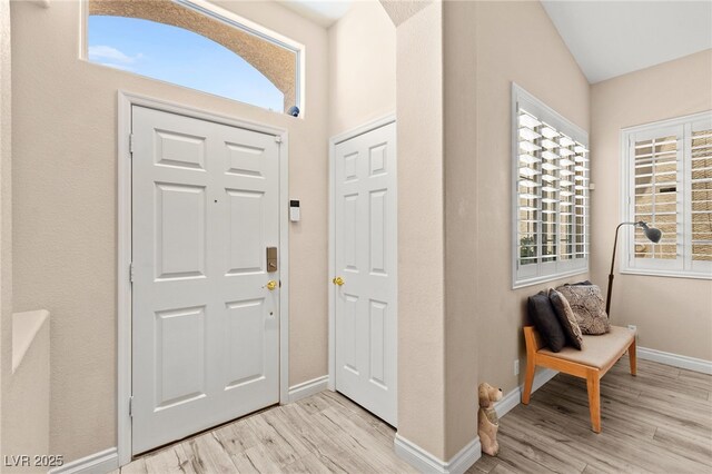 9733 Northern Dancer Dr, Las Vegas, NV 89117 - foyer entrance with light wood finished floors and baseboards